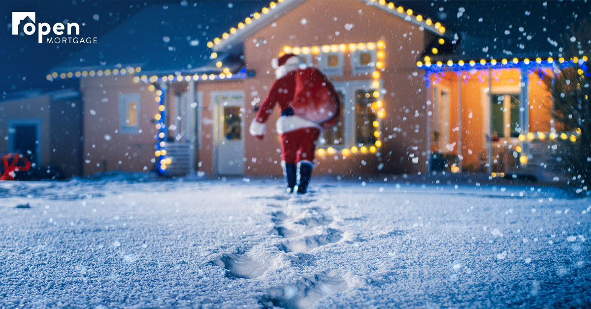 Santa walking to a house